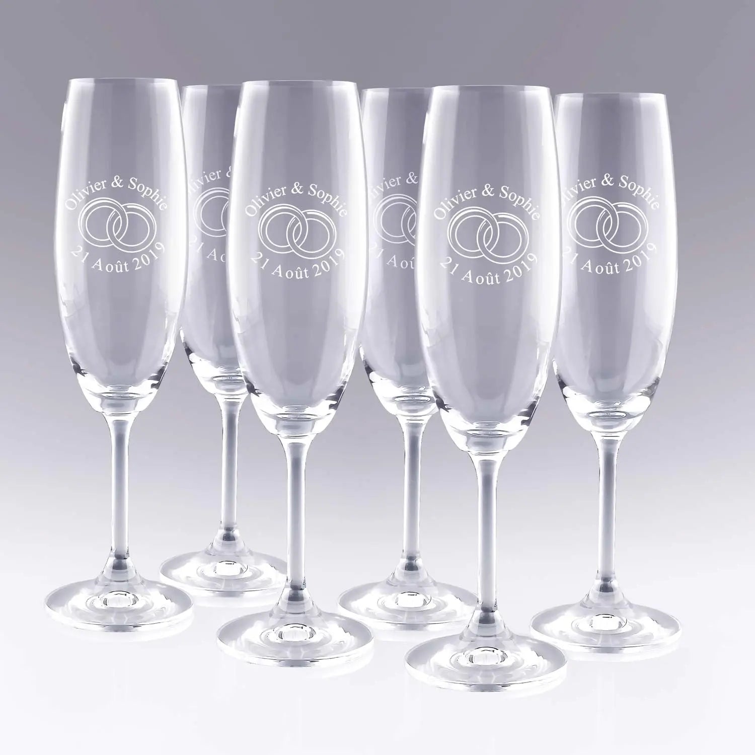 Lot de 6 flûtes à champagne personnalisées avec prénoms, date et alliances entrelacées. Cadeau idéal pour un mariage, un anniversaire ou des noces.