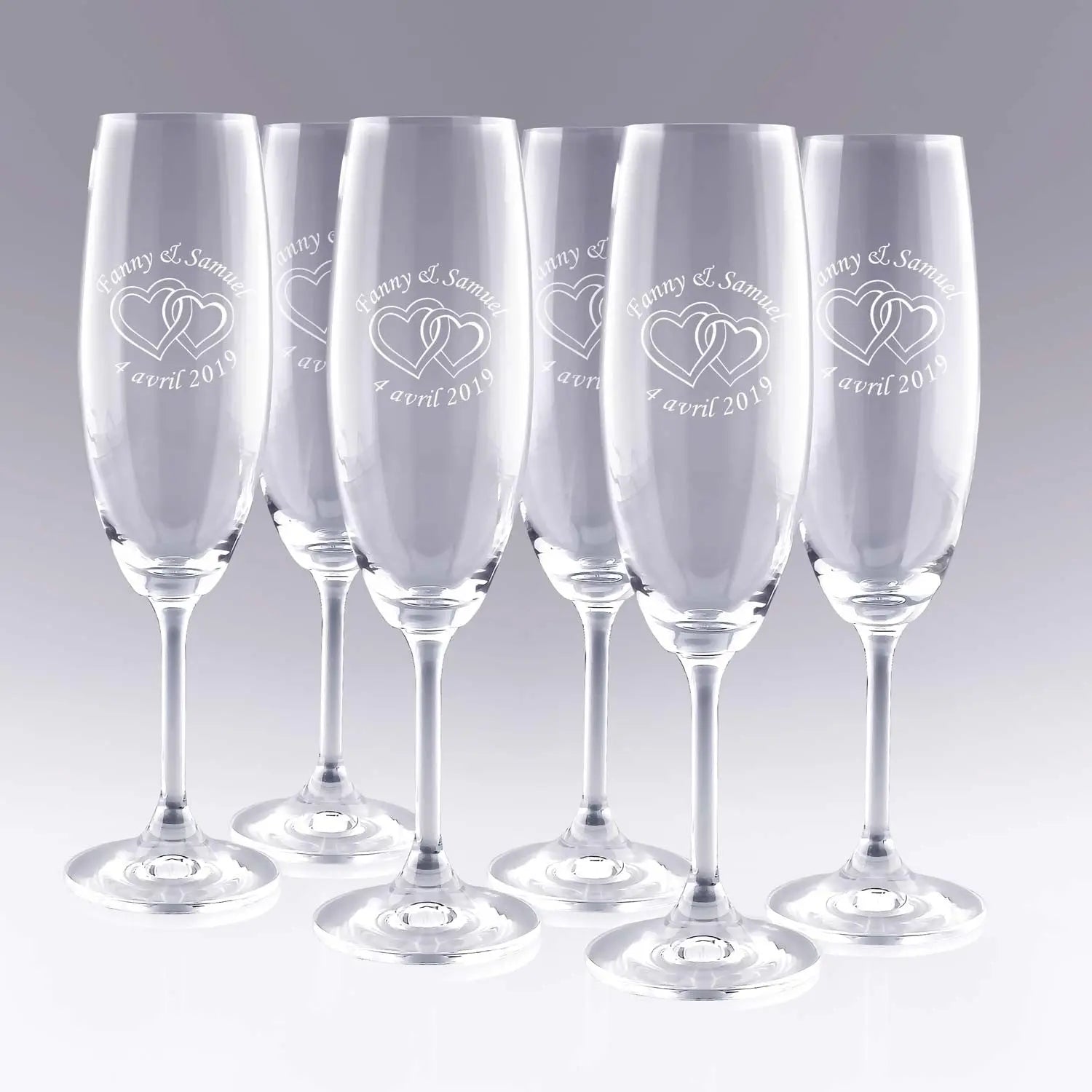 Lot de 6 flûtes à champagne personnalisées avec prénoms, date et motif de cœurs entrelacés. Cadeau idéal pour mariage, fiançailles ou Saint-Valentin.