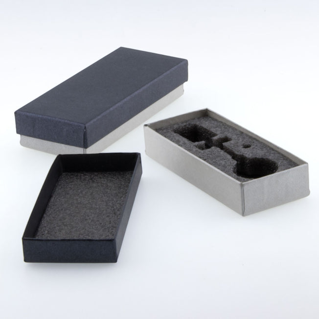 Boîte cadeau sur-mesure pour porte-clés en verre lumineux. Parfait pour offrir un souvenir personnalisé en toute élégance.