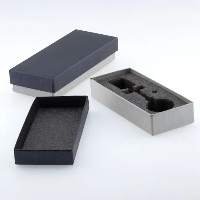Boîte cadeau sur-mesure pour porte-clés en verre lumineux. Parfait pour offrir un souvenir personnalisé en toute élégance.