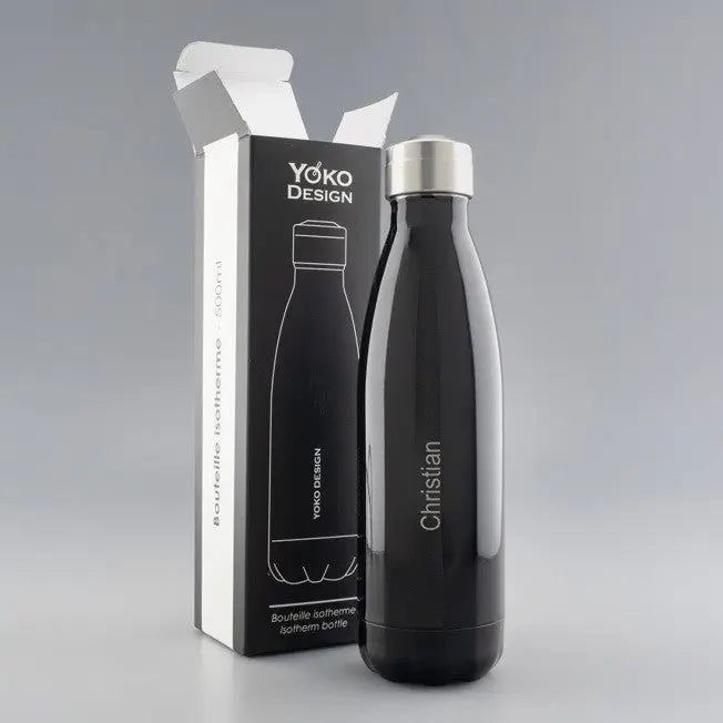 Bouteille isotherme noire personnalisée avec le prénom Christian, présentée devant sa boîte Yoko Design ouverte.