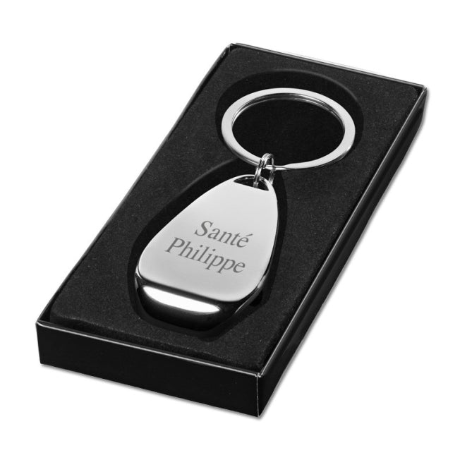 Porte-clés en métal avec gravure “Santé Philippe” présenté dans son coffret cadeau noir, idéal comme cadeau personnalisé élégant et utile.
