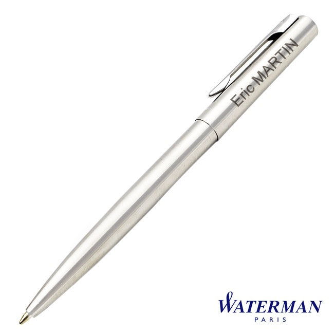 Stylo Waterman Graduate bille en acier satiné avec gravure "Eric MARTIN" visible près du clip. Design sobre et personnalisation soignée pour un cadeau durable.