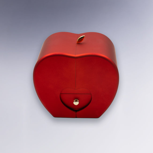 Coffret à bijoux en forme de cœur rouge brillant avec fermeture dorée. Idéal pour offrir un bijou dans un écrin élégant et raffiné.