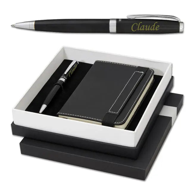 Coffret cadeau luxe contenant un stylo à bille noir personnalisé et un carnet noir assorti, parfait pour un cadeau professionnel ou personnel.