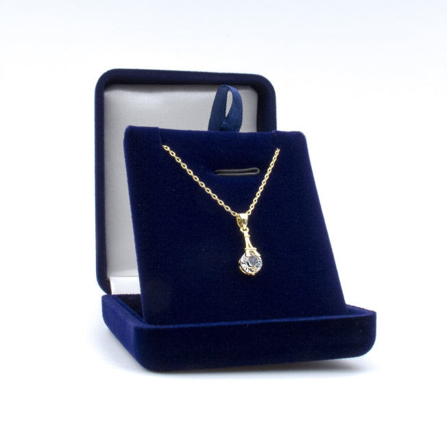 Pendentif doré avec structure Tour Eiffel et cristal Swarovski®. Présenté dans un écrin velours bleu à personnaliser pour un cadeau unique.