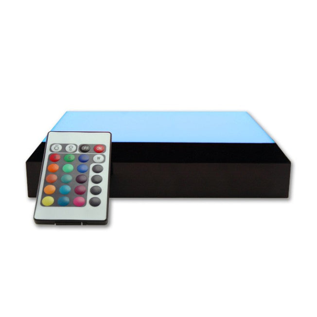 Socle lumineux interactif à LED bleue. Son design rectangulaire et sa télécommande rendent ce support parfait pour illuminer des gravures de grande taille.