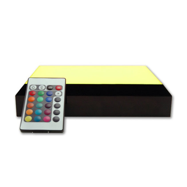 Socle lumineux rectangle à LED jaune contrôlable à distance. Il diffuse une lumière vive pour faire ressortir chaque détail de vos blocs gravés personnalisés.
