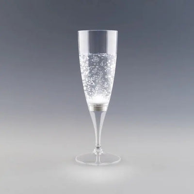 Flûte à champagne lumineuse blanche avec effet bulles, idéale pour les soirées chics et ambiance glamour.