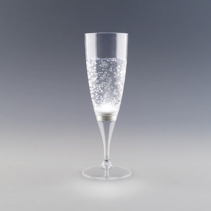 Flûte à champagne lumineuse blanche avec effet bulles, idéale pour les soirées chics et ambiance glamour.