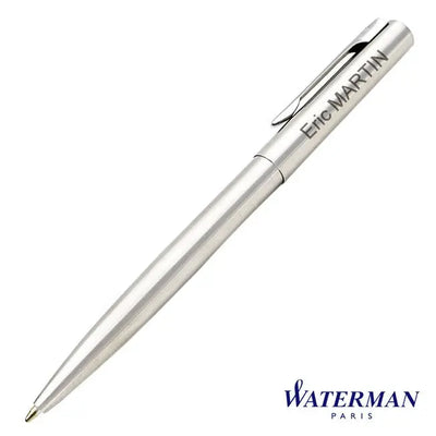 Stylo Waterman Graduate bille en acier satiné avec gravure "Eric MARTIN" visible près du clip. Design sobre et personnalisation soignée pour un cadeau durable.