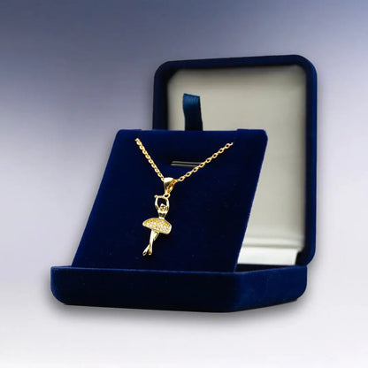 Collier Ballerine doré dans son écrin bleu personnalisable. Une idée cadeau originale et pleine de grâce pour les amatrices de danse et d’élégance.