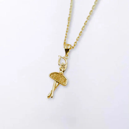 Collier Ballerine finition or, livré dans un écrin en velours personnalisable. Un bijou lumineux et poétique, parfait pour un cadeau symbolique.