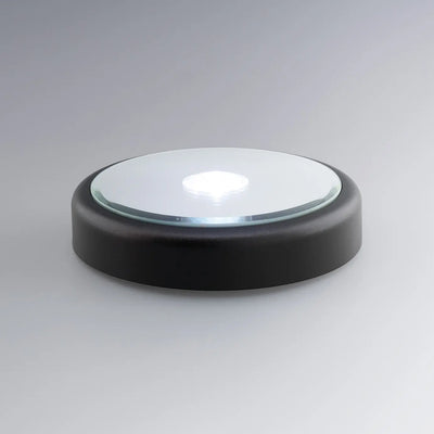 Un socle rond à LED blanc illumine les blocs gravés en 3D. Compatible avec formats cube, cœur ou demi-lune, il sublime toutes les gravures personnalisées.