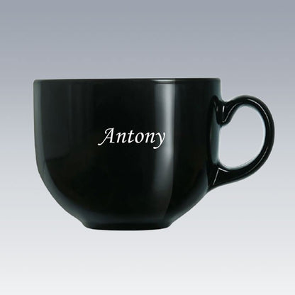 Tasse Jumbo noire en verre Luminarc personnalisée avec le prénom "Antony" en blanc. Un cadeau élégant à offrir ou à s'offrir au quotidien.
